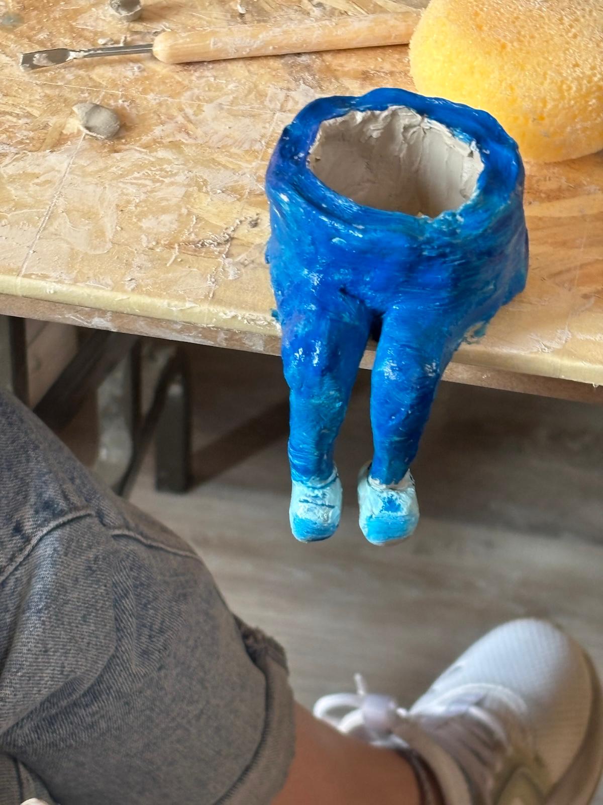Adult hand-building pottery creation
